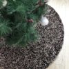 Dunkler Weihnachtsbaumteppich